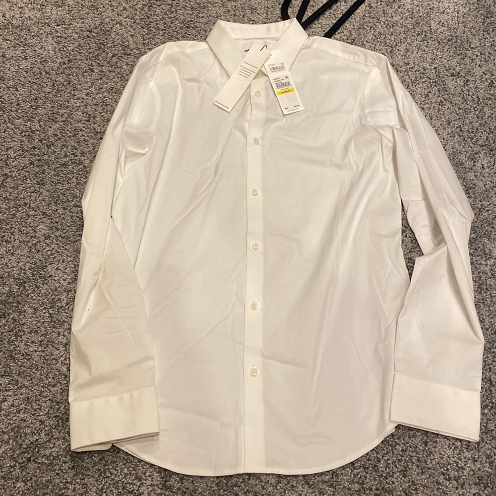 Brand new!!! Calvin Klein long sleeve button down-dress shirt.